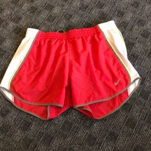 Orange Nike shorts